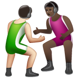 A quoi ressemblent les emoji Lutteurs : peau claire et peau foncée sur Whatsapp.
