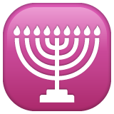 Bagaimana Menorah emoji terlihat di Whatsapp.