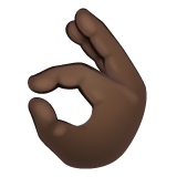 How OK Hand: Dark Skin Tone emoji looks on Whatsapp.