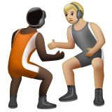 A quoi ressemblent les emoji Personnes faisant de la lutte : peau foncée et peau moyennement claire sur Whatsapp.