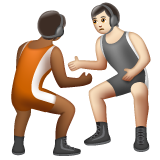 A quoi ressemblent les emoji Personnes faisant de la lutte : peau mate et peau claire sur Whatsapp.