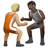 A quoi ressemblent les emoji Personnes faisant de la lutte : peau moyennement claire et peau foncée sur Whatsapp.