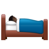 Bagaimana Person in Bed: Dark Skin Tone emoji terlihat di Whatsapp.