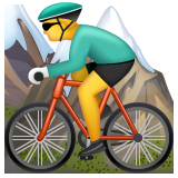 How Person Mountain Biking emoji looks on Whatsapp.