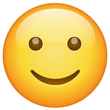 Hvordan Smiler litt emoji ser ut på Whatsapp.