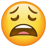 How Weary Face emoji looks on Whatsapp.