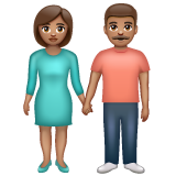 Hoe Man en vrouw hand in hand: getinte huidskleur emoji eruit ziet op Whatsapp.