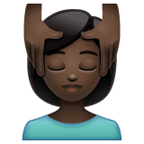 How Woman Getting Massage: Dark Skin Tone emoji looks on Whatsapp.