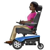 How Woman in Motorized Wheelchair: Dark Skin Tone emoji looks on Whatsapp.