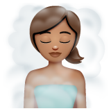 How Woman in Steamy Room: Medium Skin Tone emoji looks on Whatsapp.