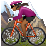 How Woman Mountain Biking: Medium-Dark Skin Tone emoji looks on Whatsapp.