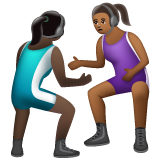 A quoi ressemblent les emoji Lutteuses : peau foncée et peau mate sur Whatsapp.