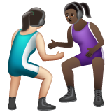 A quoi ressemblent les emoji Lutteuses : peau claire et peau foncée sur Whatsapp.