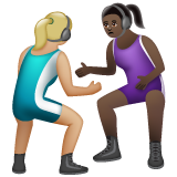 A quoi ressemblent les emoji Lutteuses : peau moyennement claire et peau foncée sur Whatsapp.